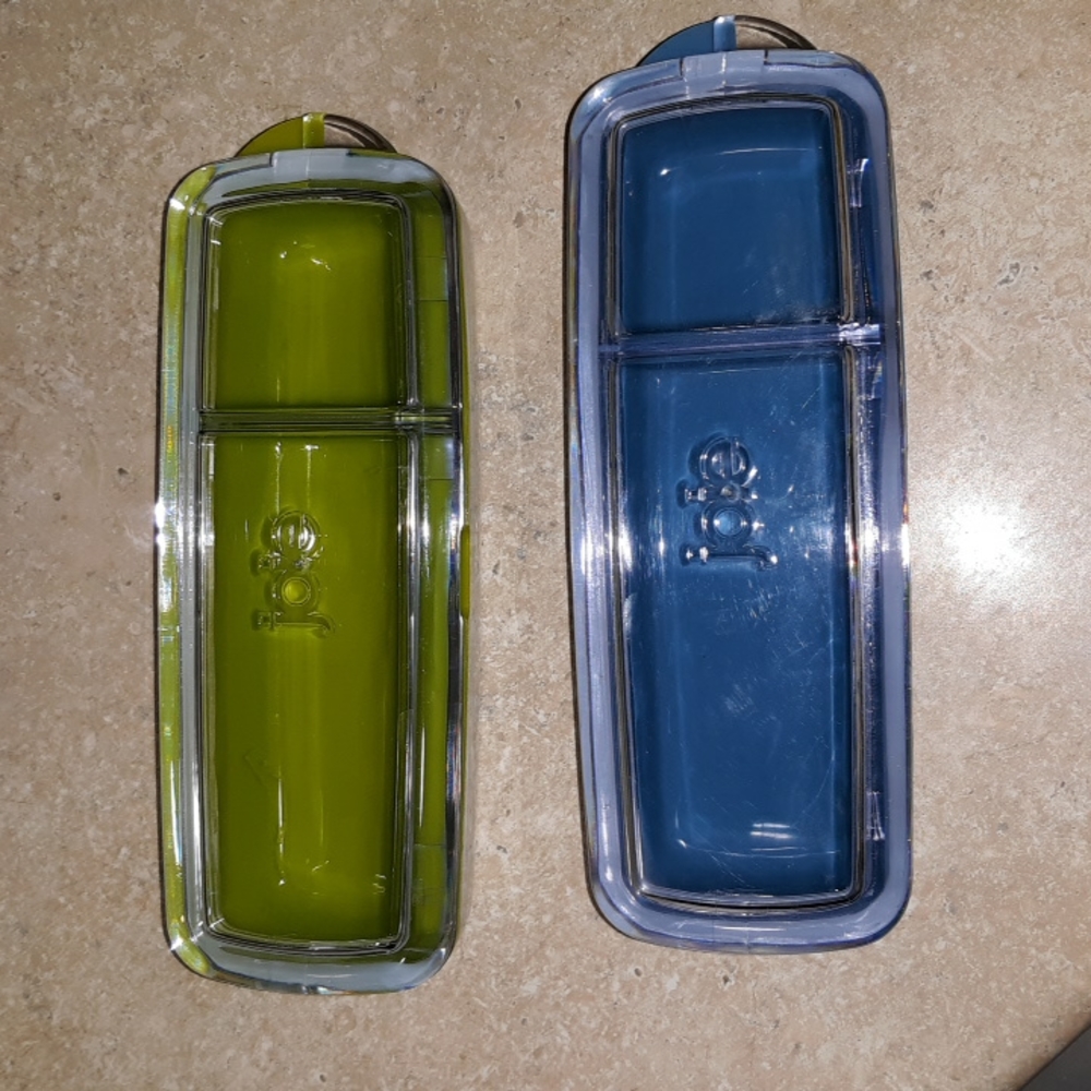 #216. Lot of 2 Joie snack boxes. Green and Blue